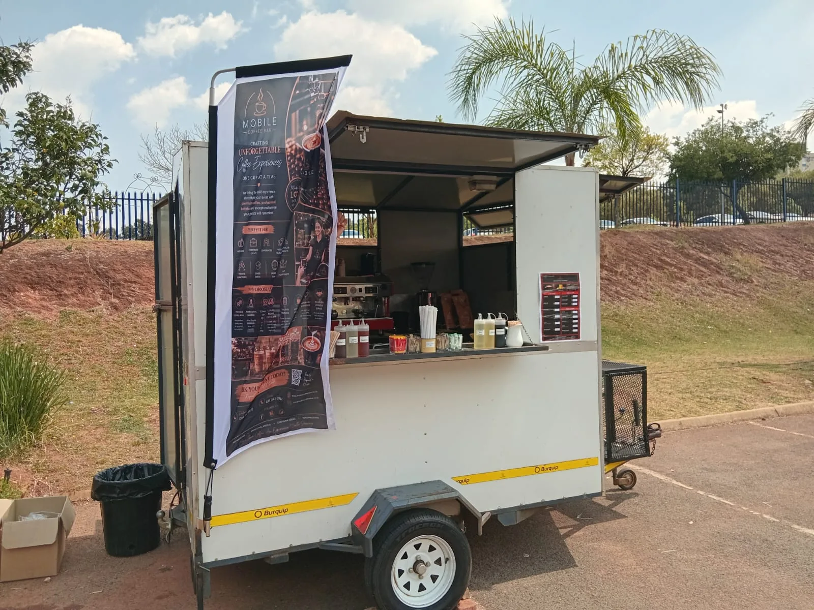 Mobile coffee trailer set up outdoors